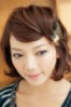 存在感のあるバレッタで二次会仕様に前髪のヘアアレンジでゴージャスな印象に