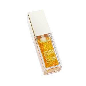 クラランス コンフォートリップオイル 07 ハニーグラム色の使い方