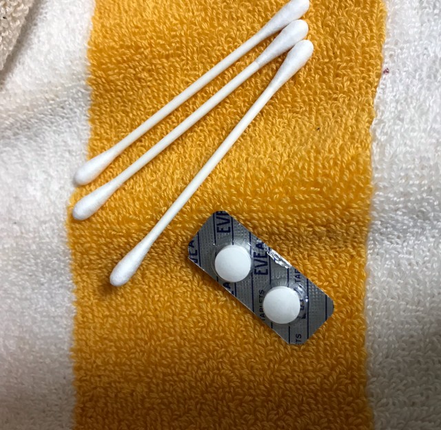綿棒と頭痛薬